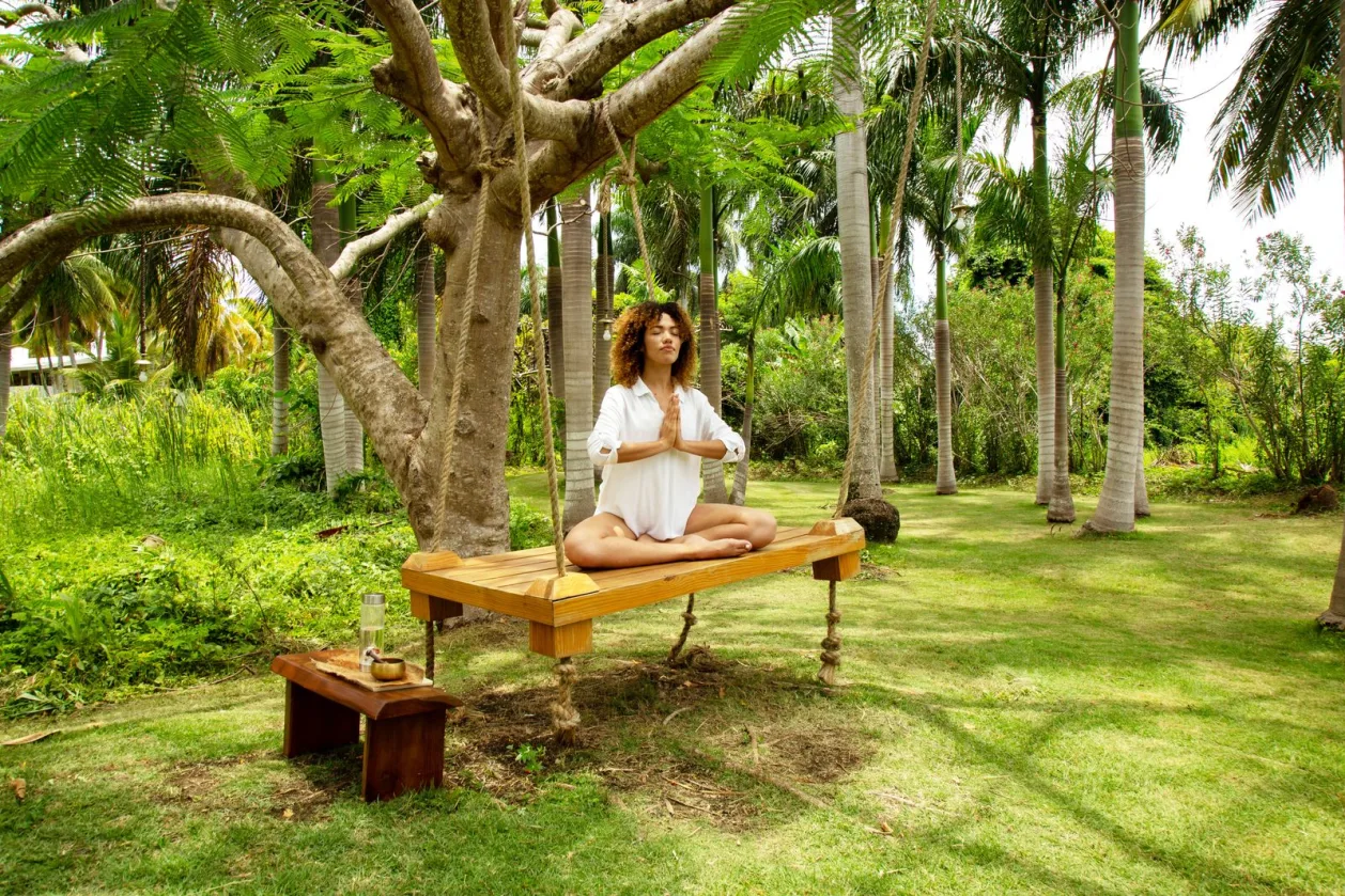 Melia Punta Cana Beach woman meditating in swing